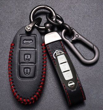 Кожаный чехол для ключа Nissan 3 кнопки + брелок с логотипом авто 108902 фото
