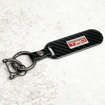 Автомобильный брелок TRD карбоновая пластина Carbon (Original) 123556 фото